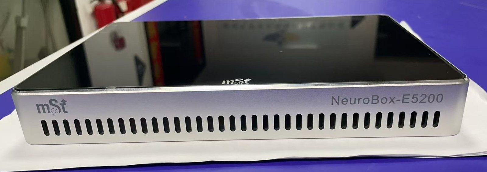 Neuro Box E5200, front view with the built-in 10.1 inch touch screen